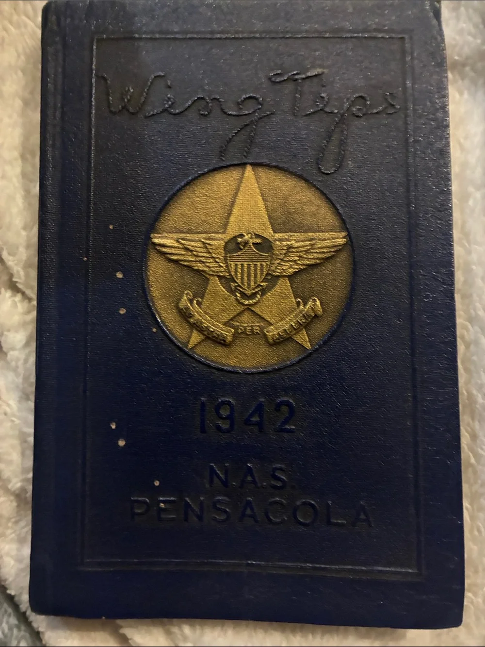 Wing Tips 1942 NAS Pensacola Hardcover in Navy Blue with Gold Emblem
